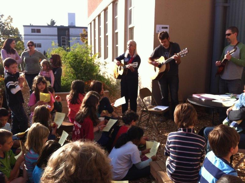 students singing outdoors
